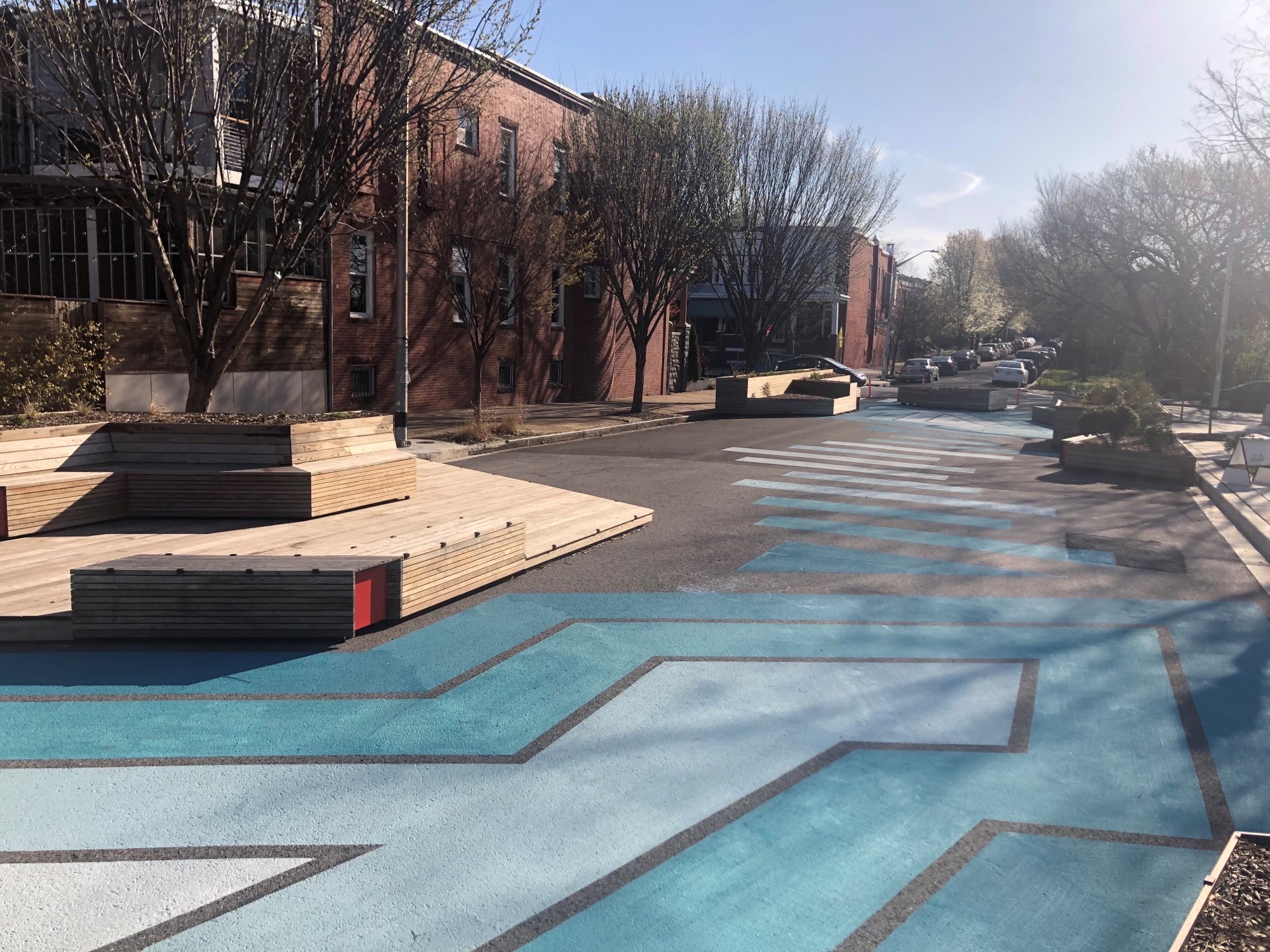 Painted plaza transforming a city street into a vibrant community space.